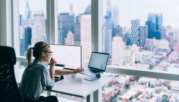 Professional woman working at desk in office